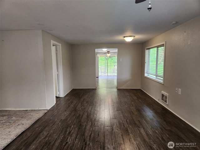 12597 US Highway 12, Randle, WA 98377 - unfurnished room with a ceiling fan, dark wood finished floors, and healthy amount of natural light
