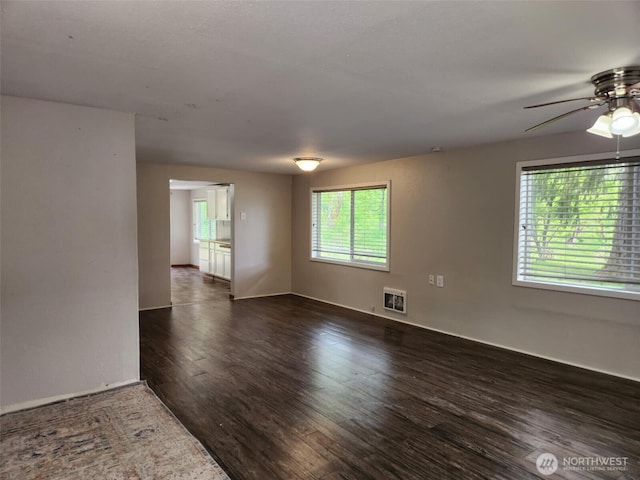 12597 US Highway 12, Randle, WA 98377 - spare room with ceiling fan and dark wood-type flooring