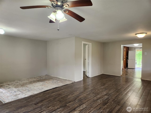 12597 US Highway 12, Randle, WA 98377 - empty room featuring dark wood-style floors and a ceiling fan