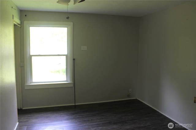 12597 US Highway 12, Randle, WA 98377 - empty room featuring ceiling fan, dark wood-type flooring, and baseboards