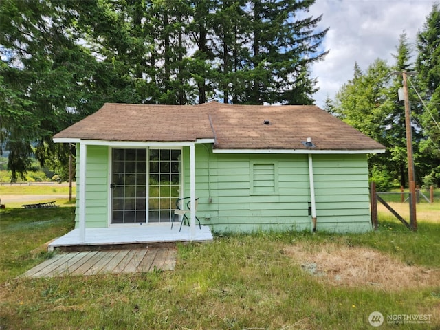 12597 US Highway 12, Randle, WA 98377 - back of property featuring a wooden deck, a yard, and a shingled roof