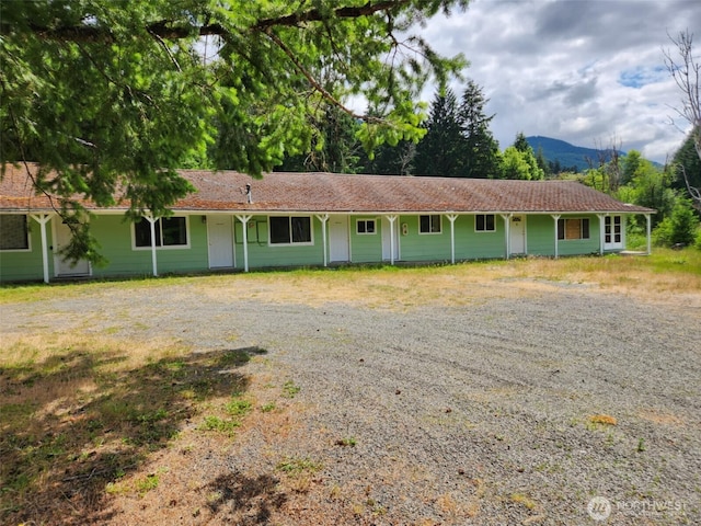 12597 US Highway 12, Randle, WA 98377 - ranch-style home featuring gravel driveway and a mountain view