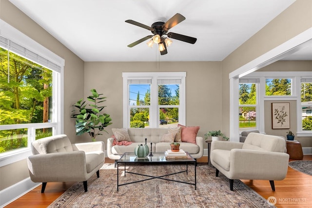 2404 Old Lakeway Dr, Bellingham, WA 98229 - living area with plenty of natural light, wood finished floors, baseboards, and ceiling fan