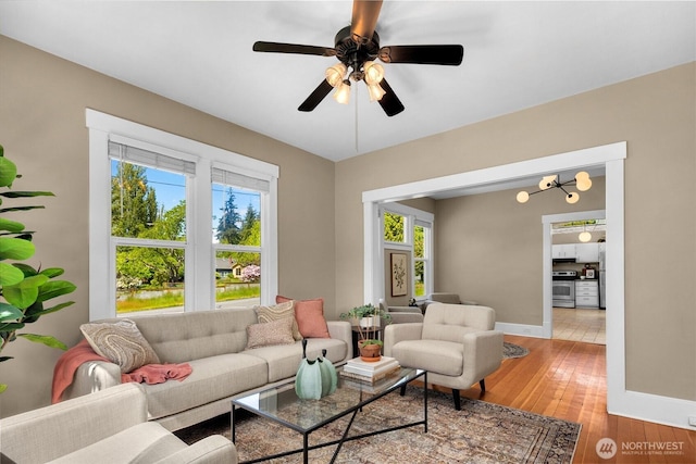 2404 Old Lakeway Dr, Bellingham, WA 98229 - living room with light wood-type flooring, a ceiling fan, and baseboards