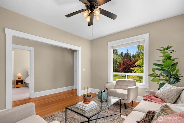 2404 Old Lakeway Dr, Bellingham, WA 98229 - living room with wood finished floors, baseboards, and a ceiling fan