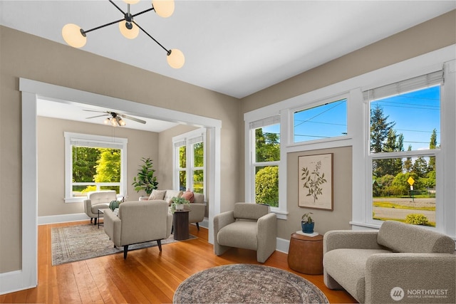 2404 Old Lakeway Dr, Bellingham, WA 98229 - living room featuring light wood-style floors, baseboards, and a ceiling fan