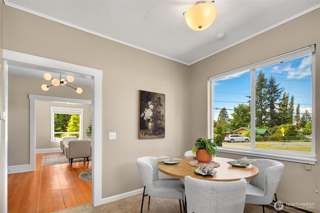 2404 Old Lakeway Dr, Bellingham, WA 98229 - dining area featuring ornamental molding, baseboards, baseboard heating, and a chandelier