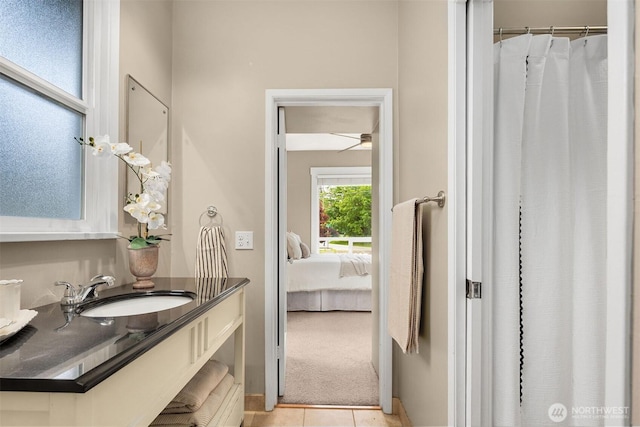 2404 Old Lakeway Dr, Bellingham, WA 98229 - bathroom with vanity, tile patterned flooring, connected bathroom, and a shower with curtain