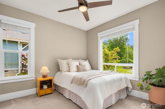 2404 Old Lakeway Dr, Bellingham, WA 98229 - bedroom featuring light carpet, baseboards, and a ceiling fan