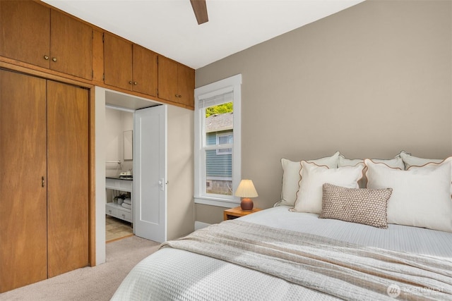 2404 Old Lakeway Dr, Bellingham, WA 98229 - bedroom featuring light colored carpet, a closet, and a ceiling fan