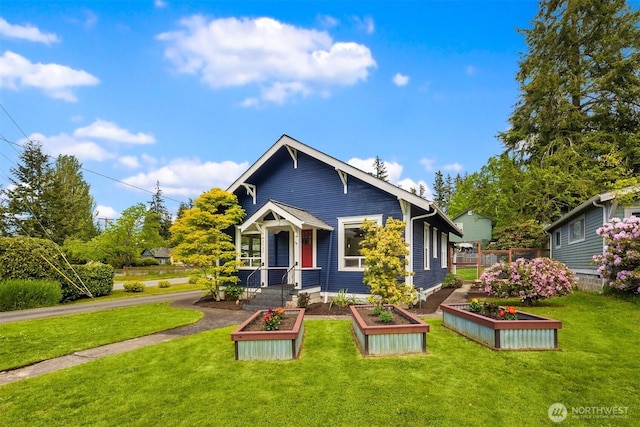 2404 Old Lakeway Dr, Bellingham, WA 98229 - view of front facade featuring a vegetable garden and a front lawn