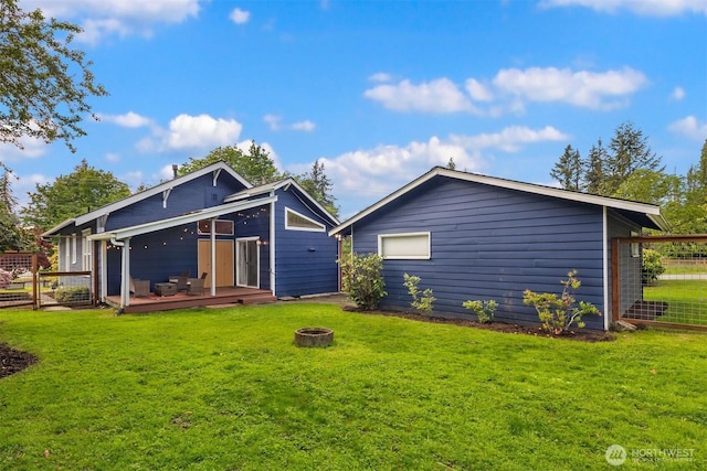 2404 Old Lakeway Dr, Bellingham, WA 98229 - rear view of house featuring an outdoor fire pit and a deck