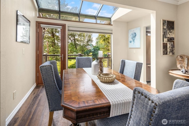 3716 Lake Washington Blvd SE Unit C, Bellevue, WA 98006 - dining room featuring wood finished floors, plenty of natural light, baseboards, and a skylight