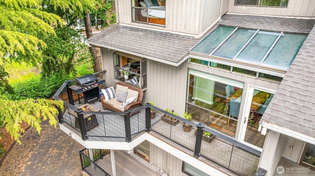 3716 Lake Washington Blvd SE Unit C, Bellevue, WA 98006 - view of home's exterior with a shingled roof and an outdoor living space