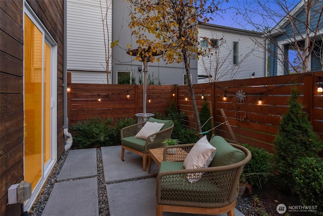 4256 S Spencer St Unit 2, Seattle, WA 98118 - fenced backyard with a patio