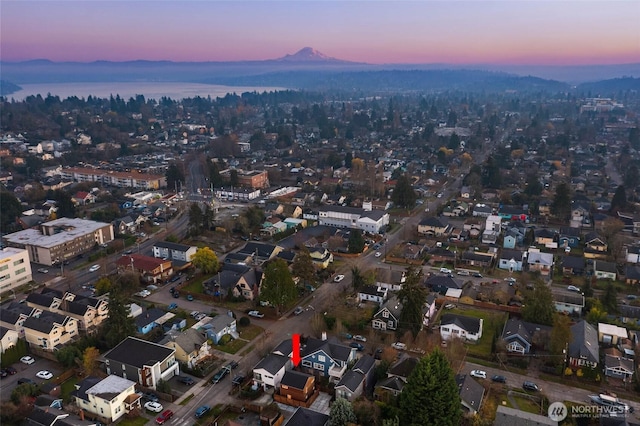 4256 S Spencer St Unit 2, Seattle, WA 98118 - aerial view at dusk of a mountain view