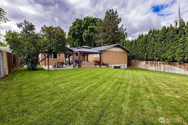 19 Mckay Pl, Walla Walla, WA 99362 - back of property with a gazebo, a patio area, and an outdoor hangout area