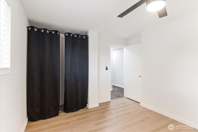 8315 NW 7th Ave, Vancouver, WA 98665 - empty room with a ceiling fan, wood finished floors, and baseboards