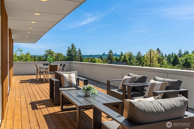 5802 43rd Ave NE, Seattle, WA 98105 - wooden deck featuring outdoor dining space and an outdoor hangout area
