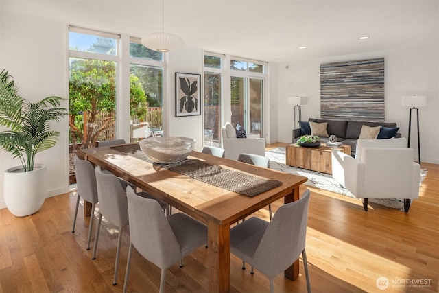 5802 43rd Ave NE, Seattle, WA 98105 - dining space featuring light wood-type flooring and recessed lighting