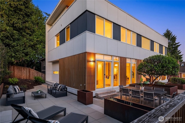 5802 43rd Ave NE, Seattle, WA 98105 - back of house featuring a patio and outdoor lounge area