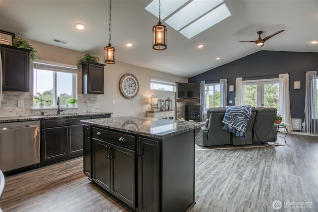 184 S Razor Clam Dr SW, Ocean Shores, WA 98569 - kitchen with a sink, dishwasher, wood finished floors, open floor plan, and a skylight