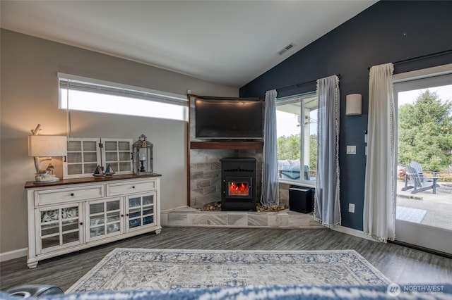 184 S Razor Clam Dr SW, Ocean Shores, WA 98569 - living area with vaulted ceiling, wood finished floors, plenty of natural light, and baseboards