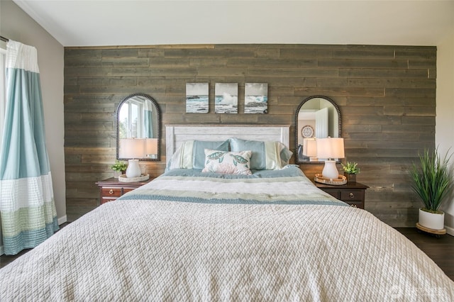 184 S Razor Clam Dr SW, Ocean Shores, WA 98569 - bedroom with wooden walls and wood finished floors