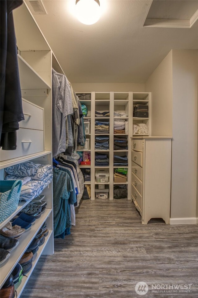 184 S Razor Clam Dr SW, Ocean Shores, WA 98569 - walk in closet featuring wood finished floors