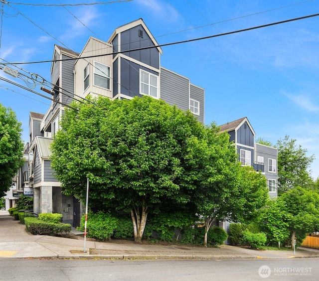 9057 Greenwood Ave N Unit 201, Seattle, WA 98103 - view of front of property with board and batten siding