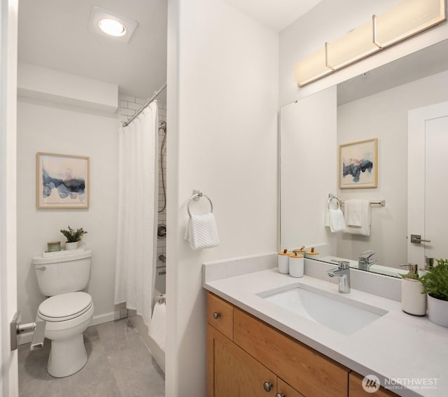 9057 Greenwood Ave N Unit 201, Seattle, WA 98103 - bathroom featuring toilet, vanity, and shower / bath combo with shower curtain