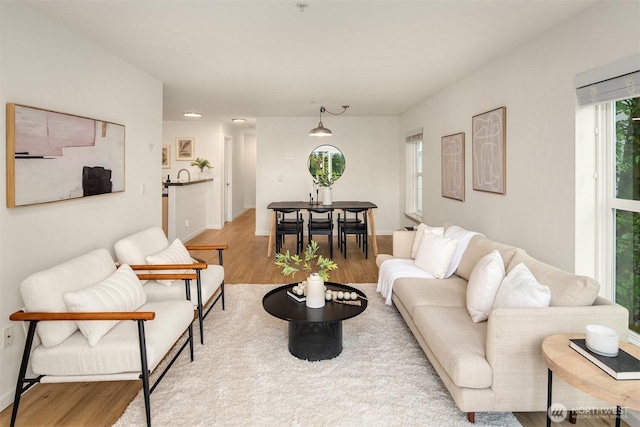 9057 Greenwood Ave N Unit 201, Seattle, WA 98103 - living room featuring wood finished floors and baseboards