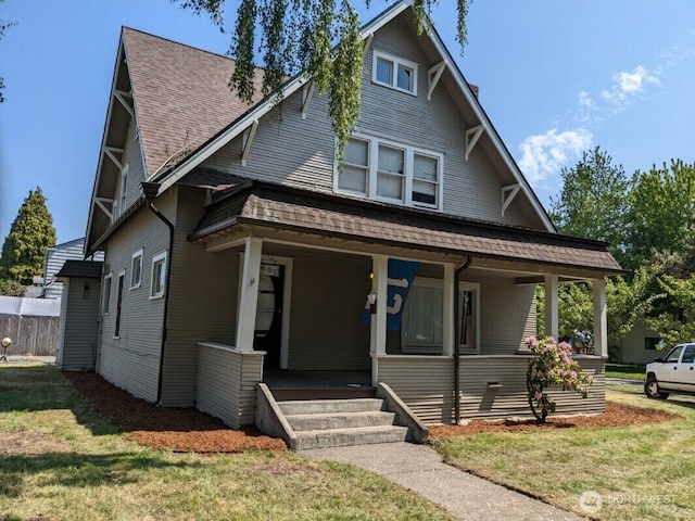 603 2nd St NW, Puyallup, WA 98371 - view of front of house with a porch and roof with shingles