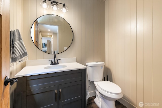 9111 Custer School Rd, Custer, WA 98240 - half bath with vanity, toilet, and wood finished floors