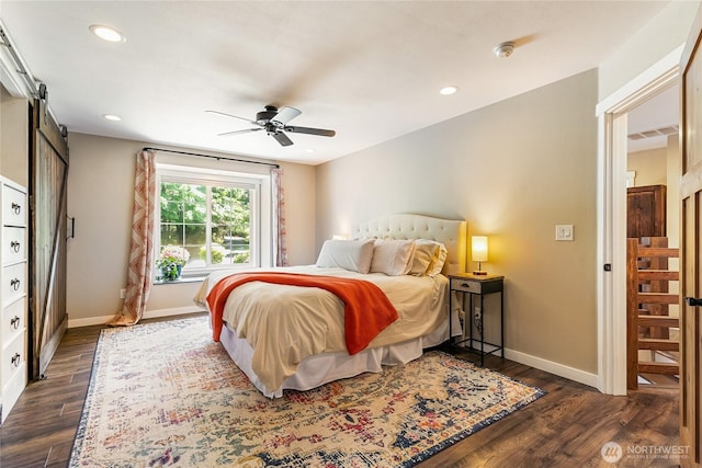 9111 Custer School Rd, Custer, WA 98240 - bedroom with a barn door, baseboards, dark wood-type flooring, and recessed lighting