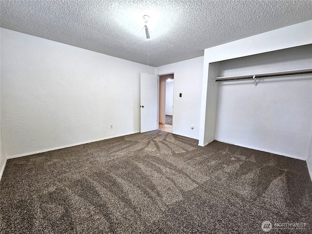 8927 178th Ave SW, Rochester, WA 98579 - unfurnished bedroom featuring carpet flooring, a textured ceiling, and a closet