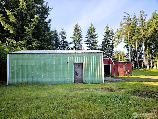 8927 178th Ave SW, Rochester, WA 98579 - view of pole building featuring a yard