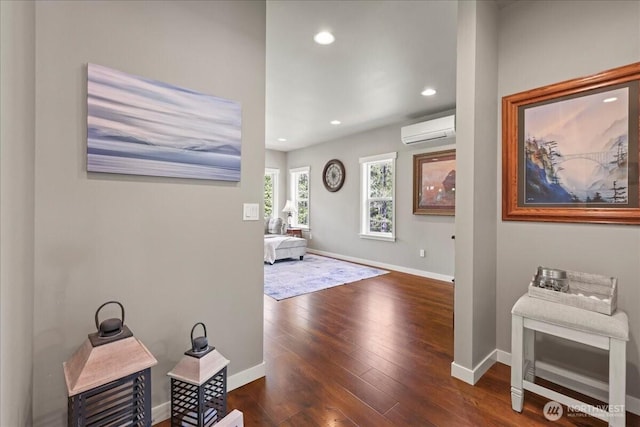 190 E Country Club Dr W, Union, WA 98592 - hall featuring a wall mounted air conditioner, baseboards, dark wood finished floors, and recessed lighting