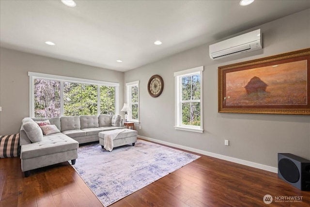 190 E Country Club Dr W, Union, WA 98592 - living room featuring a wall mounted air conditioner, dark wood-type flooring, baseboards, healthy amount of natural light, and recessed lighting
