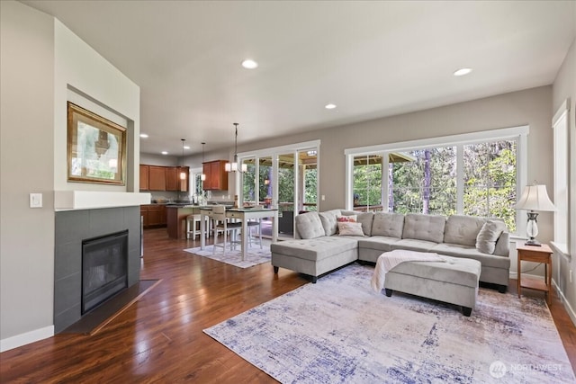 190 E Country Club Dr W, Union, WA 98592 - living room with dark wood-type flooring, recessed lighting, baseboards, and a tile fireplace