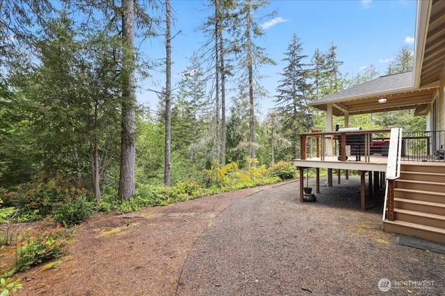 190 E Country Club Dr W, Union, WA 98592 - view of yard featuring a wooden deck, stairway, and driveway