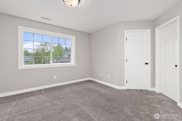 22014 48th Avenue Ct E, Spanaway, WA 98387 - unfurnished bedroom with carpet floors and baseboards