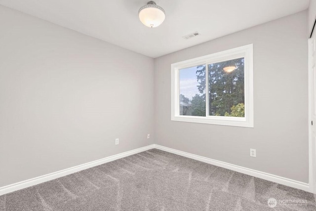 22014 48th Avenue Ct E, Spanaway, WA 98387 - unfurnished room with baseboards and carpet flooring
