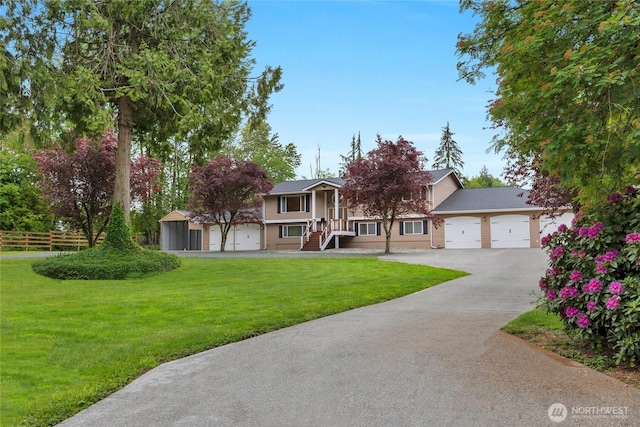 4622 128th Ave NE, Lake Stevens, WA 98258 - view of front facade featuring concrete driveway and a garage