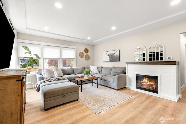 5116 N 40th St, Tacoma, WA 98407 - living room featuring plenty of natural light, light wood finished floors, a glass covered fireplace, and recessed lighting