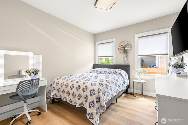 5116 N 40th St, Tacoma, WA 98407 - bedroom with light wood finished floors and a desk