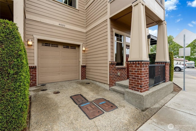 4020 NE 3rd Pl Unit B, Renton, WA 98056 - doorway to property with brick siding