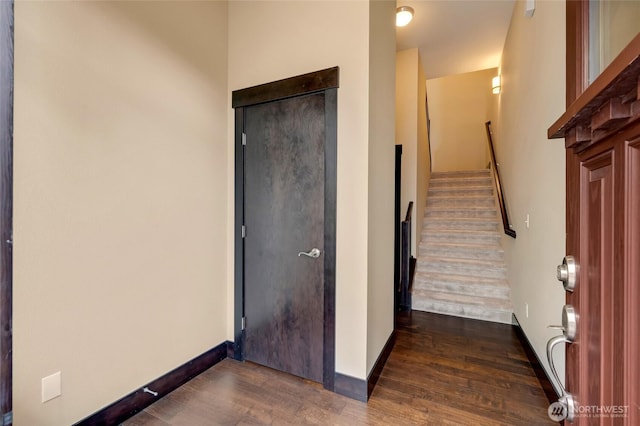 4020 NE 3rd Pl Unit B, Renton, WA 98056 - staircase featuring wood finished floors and baseboards