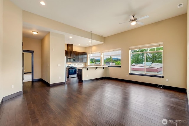 4020 NE 3rd Pl Unit B, Renton, WA 98056 - unfurnished living room with a ceiling fan, dark wood-style flooring, baseboards, and recessed lighting