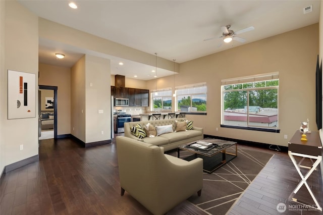 4020 NE 3rd Pl Unit B, Renton, WA 98056 - living area with a ceiling fan, dark wood-style floors, healthy amount of natural light, baseboards, and recessed lighting